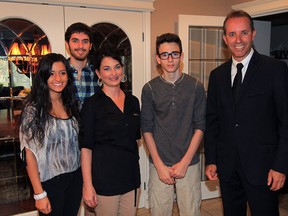 City of Windsor councillor Bill Marra, right, daughter Bianca, 18, left, sons Joe-Anthony, 19, and Dante, 15, and wife Rita, centre, after his announcement he will be a candidate in Ward 8, from his home in East Windsor, Thursday June 19, 2014. Marra will not seek the mayor's chair. (NICK BRANCACCIO/The Windsor Star)