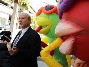 Larry Horwitz, chairman of the DWBIA, pleads for sponsors for the upcoming Balloonapalooza in front of the DWBIA offices in Windsor on Thursday, June 5, 2014. According to Horwitz the festival will be cancelled unless they are able to generate another $30,000 in sponsorship. (Tyler Brownbridge/The Windsor Star)