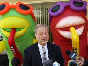 Larry Horwitz, chairman of the DWBIA, pleads for sponsors for the upcoming Balloonapalooza in front of the DWBIA offices in Windsor on Thursday, June 5, 2014. According to Horwitz the festival will be cancelled unless they are able to generate another $30,000 in sponsorship. (Tyler Brownbridge/The Windsor Star)