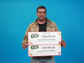 Windsor resident Fares Al Ali holds his winning Keno tickets. (OLG Handout)