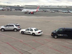 This picture taken by Chantal Vallee shows a security situation at Toronto's Pearson International Airport on June 19, 2014.