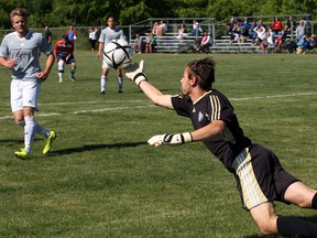 Ancaster Bishop Tonnos keeper Yannick Golanbari tips the ball to teammates against Windsor Holy Names in boys AAAA OFSAA soccer at McHugh Park Thursday June 5, 2014. (NICK BRANCACCIO/The Windsor Star