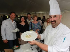 Chef Ahron Goldman, Executive Chef at Maryvale serves up thai style scallops during the 11th annual "sous-dough chef" Garden Party held at MaryVale in Windsor, Ontario on June 11, 2014.  The evening of food and fundraising in support of Maryvale was hosted by Denise and Peter Hrastovec and Jennifer Jones and Dr. Nick Krayacich.  (Jason Kryk/The Windsor Star)