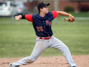 Holy Names shortstop Rex Romero throws to first against the Massey Mustangs at Central Park. (DAX MELMER/The Windsor Star)