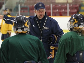 University of Windsor women's hockey head coach Jim Hunter instructs the team during practice at South Windsor Arena. (JASON KRYK/The Windsor Star)