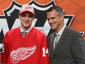 Dominic Turgeon, left, with his father Pierre after being drafted 63rd by the Detroit Red Wings on Day 2 of the 2014 NHL Draft at the Wells Fargo Center on June 28, 2014 in Philadelphia.  (Photo by Bruce Bennett/Getty Images)
