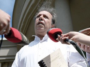 Defence Lawyer Jim Heller speaks to the media outside of the Prince George courthouse, June 3, 2014, at the murder-times-four trial of Cody Legebokoff. (Prince George Citizen/Brent Braaten/The Canadian Press)