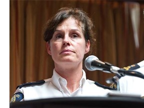 Marlene Snowman, superintendent of Codiac RCMP, is stricken at the prospect of soon having to leave her staff for a posting in Nova Scotia as preparations are being made to bury three slain officers in Moncton, N.B., on June 3, 2014. (Marc Grandmaison/The Canadian Press)