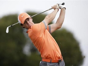 In this Thursday, Feb. 27, 2014 file photo, Rory McIlroy of Northern Ireland tees off on the fifth hole during the first round of the Honda Classic golf tournament, in Palm Beach Gardens, Fla. Rory McIlroy has decided to play for Ireland, not Britain, at the 2016 Olympics in Rio de Janeiro. The 25-year-old McIlroy, who is from Northern Ireland, was eligible to play for Britain or Ireland and had been wrangling over a decision for more than a year. The two-time major winner says Wednesday, June 18, 2014 "I have been thinking about the decision a lot and remembered all the times I represented Ireland as an amateur."(AP Photo/Lynne Sladky, File)