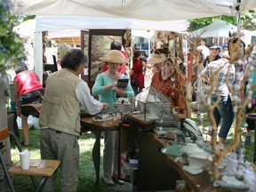 People shop for jewelry at Art in the Park, Saturday, June 7, 2014.  (DAX MELMER/The Windsor Star)