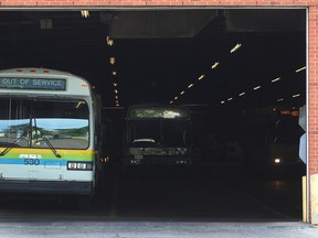 An out of service city bus is parked in a garage at Transit Windsor at 3700 North Service Road East, Saturday, June 21, 2014.  (DAX MELMER/The Windsor Star)