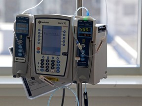 An infusion drug to treat cancer is administered to a patient through an intravenous drip. (Associated Press files)