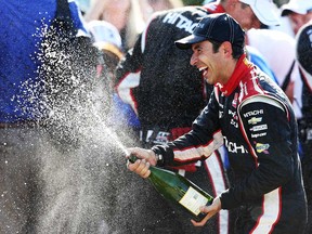 Helio Castroneves, driver of the No. 3 Team Penske Dallara Chevrolet celebrates after winning the Verizon IndyCar Chevrolet Indy Dual II at The Raceway on Belle Isle on June 1, 2014 in Detroit, Michigan.  (Nick Laham/Getty Images)