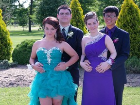 Left to right, Keirstin Diotte, Alexander Pare, Jacqueline Taranto, Joseph Tran.attend the Catholic Central prom on June 7th 2014.
(Photo by Jeannette Taranto)