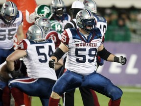 Montreal Alouettes' tackle Josh Bourke celebrates a tackle during first-quarter action of the 2010 Grey Cup final between the Montreal Alouettes and the Saskatchewan Roughriders at Commonwealth Stadium in Edmonton November 28, 2010.  (Chris Schwarz / Postmedia News)
