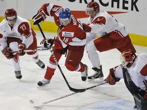 Czech Republic forward Tomas Nosek, centre, battles Demark's Anders Thode, left, and Tobias Hansen at the 2012 World Junior Hockey Championships at Rexall Place in Edmonton, December 27, 2011. (Ed Kaiser/Edmonton Journal)