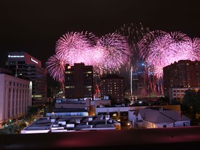 The 56th Annual Ford Fireworks lights up the sky between Windsor, Ontario and Detroit, Michigan on June 23, 2014. (JASON KRYK/The Windsor Star)