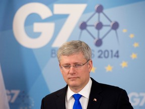 Prime Minister Stephen Harper speaks with the media during a news conference following the G7 meetings on June 5, 2014 in Brussels, Belgium. (Adrian Wyld/The Canadian Press)