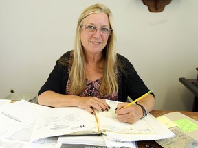 Mary Lou Dolan, in her office in Windsor on June 16, 2014, leads two teams of workers who support about 200 people with severe mental health issues in the Windsor region.  (Tyler Brownbridge/The Windsor Star)