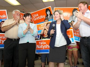 MPP Percy Percy Hatfield, (L), Windsor West NDP candidate Lisa Gretzky, Ontario NDP Leader Andrea Horwath and MPP Taras Natyshak, greet supporters Monday, June 9, 2014, during a campaign stop in Windsor, Ont. (DAN JANISSE/The Windsor Star)