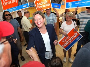 Ontario NDP Leader Andrea Horwath greets supporters on Monday, June 9, 2014, during a campaign stop in Windsor. (DAN JANISSE/The Windsor Star)