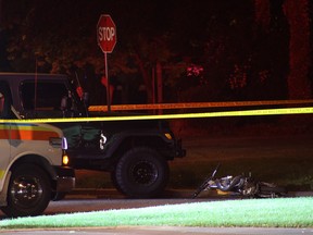 The scene of a fatal collision between a dirt bike and a Jeep Wrangler on Riverside Drive East at Eastlawn Avenue on June 15, 2014. (Rick Dawes / The Windsor Star)