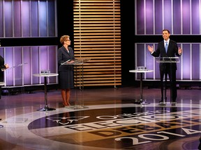 Ontario NDP leader Andrea Horwath, left, Ontario Premier Kathleen Wynne, centre, and Ontario PC leader Tim Hudak, right, take part in the live leaders debate at CBC during the Ontario election in Toronto on Tuesday, June 3, 2014. THE CANADIAN PRESS/Frank Gunn