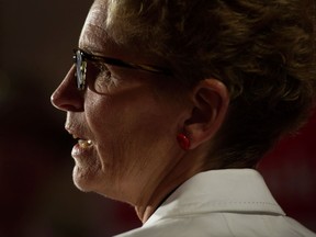 Ontario Liberal Leader Kathleen Wynne speaks to supporters while campaigning in Waterdown, Ont. on  June 7, 2014. (Darren Calabrese/The CanadianPress)
