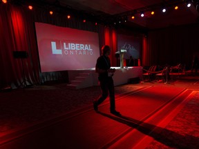 A man walks through the Liberal party's election night headquarters in Toronto prior to the polls closing for the Ontario provincial election on Thursday, June 12, 2014. (THE CANADIAN PRESS/Darren Calabrese)