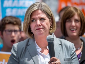Ontario NDP Leader Andrea Horwath speaks in front of supporters while campaigning in Brantford, Ont. on Tuesday, June 10, 2014. THE CANADIAN PRESS/Darren Calabrese