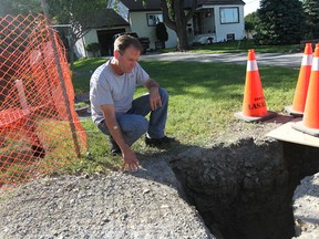 WINDSOR, ONTARIO- June 4, 2014 - Homeowner Dan Delisle's sewer line was cut by a subcontractor on the Herb Gray Parkway but wasn't told about it until after his basement flooded several times and the town of LaSalle discovered the problem.  (JASON KRYK/The Windsor Star)