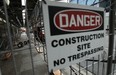 The scaffolding remains on the outside of the Paul Martin Building in Windsor on Wednesday, June 11, 2014.               (Tyler Brownbridge/The Windsor Star)