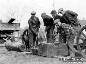 Artillery lumbered through the streets of Windsor on Jan. 28, 1932, as the first step in the demolition of the old Post Office. The old Cremean gun, which has graced the lawn back of the building for many years, was moved to its new resting place in City Hall Park. It was a heavy job, the bronze gun being carried on a special trailer attached to a motor truck. It was necessary to cut away the curb skirting, the driveway in the rear of the Post Office before the moving could take place. The photo shows workmen unloading part of the stone foundation at City Hall Park. (FILES/The Windsor Star)