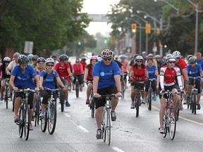 Cyclists take part in the Ride Don't Hide on Riverside Dr. East, in support of mental health, Sunday, June 22, 2014.  (DAX MELMER/The Windsor Star)