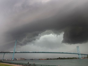 A menacing sky hangs over the Ambassador Bridge on Wednesday, June 18, 2014, just moments before a heavy downpour. (DAN JANISSE/The Windsor Star)