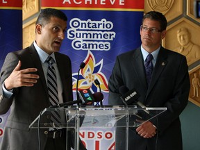 Mayor Eddie Francis and Ontario Summer Games general manager Michael Chantler (right) speak during a call for volunteers for the upcoming Ontario Summer Games at a press conference at city hall in Windsor on Wednesday, June 18, 2014.                (Tyler Brownbridge/The Windsor Star)