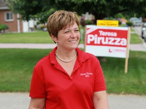 In this file photo, Teresa Piruzza campaigns on St. Clair Road in Windsor, Ontario on June 10, 2014.  (JASON KRYK/The Windsor Star)