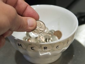 Just where to tip and not to tip is a mysterious, even whimsical business. (Ryan Remiorz/The Canadian Press)