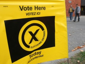A sign outside a polling station in Toronto is shown in this file photo. (Brent Foster / National Post)