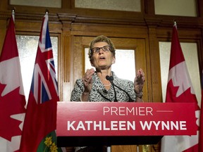 Premier Kathleen Wynne speaks at Queen's Park on June 13, 2014. (Nathan Denette / The Canadian Press)