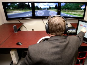 One of Canada’s strengths in the auto industry is its research and development. In this photo from January 2009, University of Windsor’s Dr. Colin Novak sits at a NVH Desktop Simulator, which helps automotive acoustics engineers develop innovative products to reduce noise vibration harshness. (Windsor Star files)