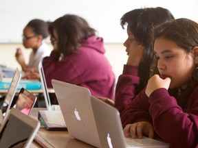 With laptops so prevalent in children's lives, it is critical that they take a break from the computer to give their eyes a rest. (CODY DUTY / Associated Press)