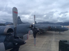 On the first flight of the RIMPAC naval exercise, a Canadian CP-140 Aurora maritime patrol aircraft, which had benefited from a $1.5-billion upgrade to its sensors and radars, successfully hunted for a US Navy nuclear submarine and simulated destroying it. (Matthew Fisher/Postmedia News.