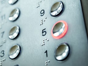 Elevator buttons have more bacteria on them than the surface of a toilet stall, according to a new study.
Photograph by: diego cervo , Fotolia.com