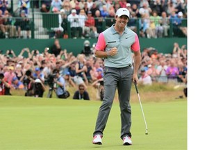 Rory McIlroy of Northern Ireland celebrates his two-stroke victory on the 18th green during the final round of The 143rd Open Championship at Royal Liverpool on July 20, 2014 in Hoylake, England.
( Andrew Redington/Getty Images)