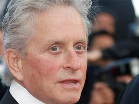 Actor Michael Douglas arrives for the screening of Wall Street - Money Never Sleeps presented out of competition at the 63rd Cannes Film Festival on May 14, 2010 in Cannes.
Photograph by: FRANCOIS GUILLOT/AFP/Getty Images/Files , Postmedia News