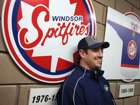 Bob Boughner is pictured next to a vintage Windsor Spitfires jersey in this 2013 file photo. (DAX MELMER/The Windsor Star)
