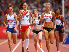 Ex-Lancer Melissa Bishop, right, competes in the women's 800 metres heats at Hampden Park at the Glasgow 2014 Commonwealth Games. (Photo by Richard Heathcote/Getty Images)