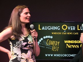 Kate Conner, left, chats with Joshua Haddon, organizer of the Border City Comedy Festival, in the Windsor Star News Cafe on July 11, 2014.