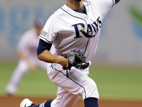 Tampa Bay starting pitcher David Price delivers a pitch to the Milwaukee Brewers in St. Petersburg. (AP Photo/Chris O'Meara)